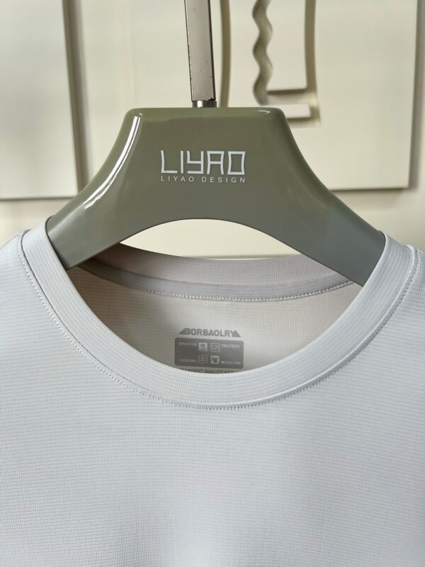 Odzież sportowa dla mężczyzn Jasno szary krótki - top z rękawem i spodnie, oddychająca i wygodna koszulka dla mężczyzn